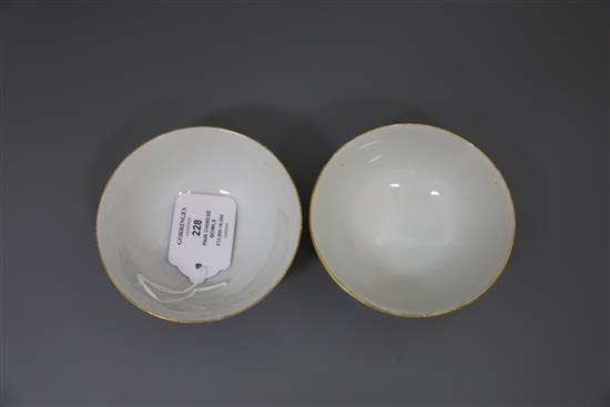 A pair of Chinese yellow ground famille rose bowls, Daoguang six character seal mark and probably of the period (1821-50), Diam.11.5cm